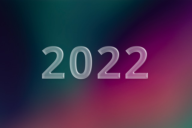 Image of the number 2022 on a black and purple background