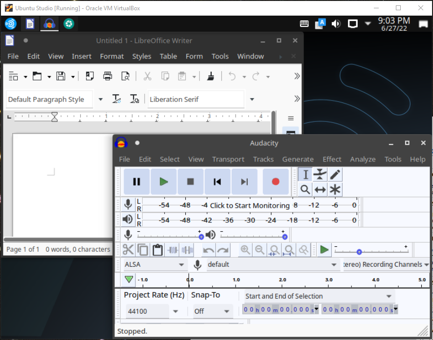 Screenshot of VirtualBox here it is seen running LibreOffice Writer Word processor and Audacity, an audio software utility.